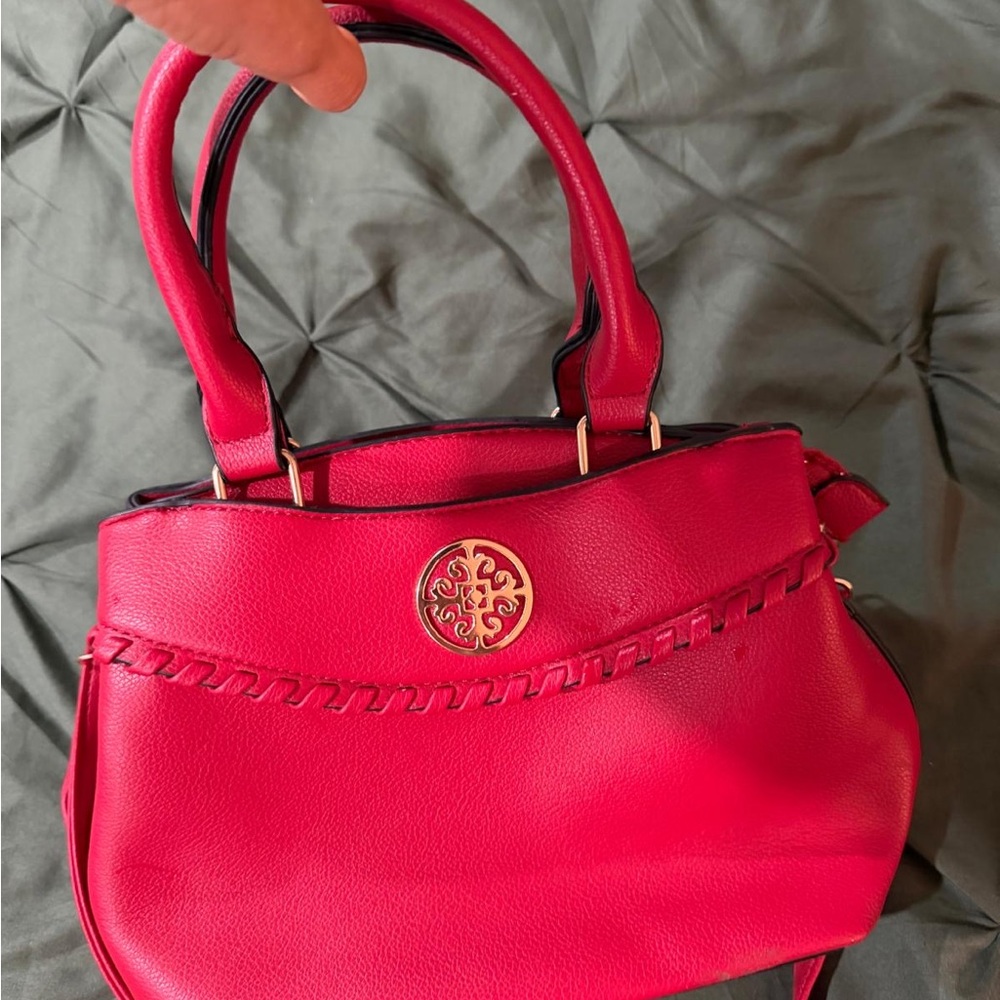Elegant Red Shoulder Bag with Gold Emblem